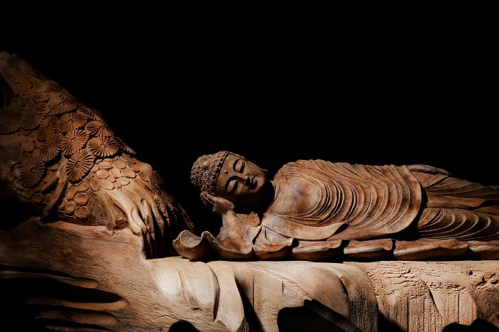 Hand-carved Wooden Reclining Buddha With Base