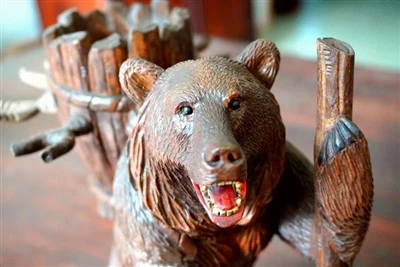 The Role of Black Forest Carved Bear Wine Rack